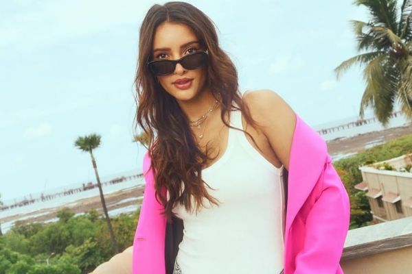 Tripti Dimri Serves Boss Babe Energy in Bold Pink Blazer and Ripped Denim Look