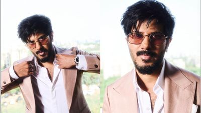 Dulquer Salmaan Steals Hearts In Pink Suit And Playful Pictures