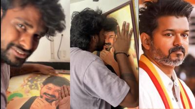 தளபதியை எல்லாம் யாராவது தொட முடியுமா? விஜய் போட்டோவை கட்டிப்பிடித்து அழுத ரசிகரைத் தேற்றும் பெண்