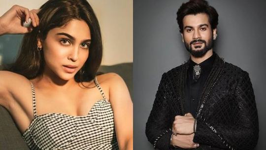 Sharvari and Sunny Kaushal posing together at a public event