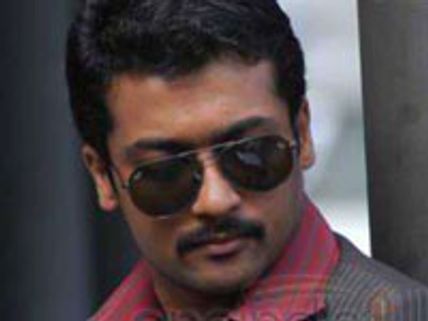 Surya in double roles as Father and Son