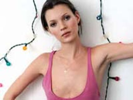 Booze queen Kate Moss defies blurry eyes 