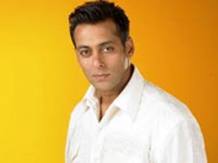 Salman gives laptop to a handicapped lady
