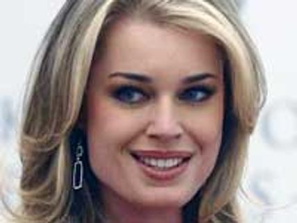 Rebecca Romijin keen on singing career