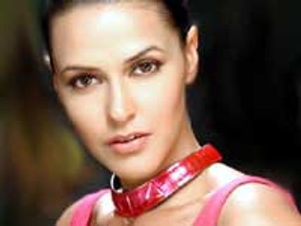 Neha Dhupia takes up Squash seriously