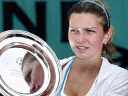 Simona Halep to get a boob job done