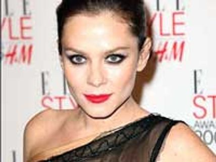 Anna Friel seen in a breast exposing dress