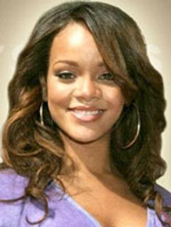 Rihanna dismisses being back with Chris Brown