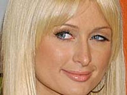 Paris defends her party girl image