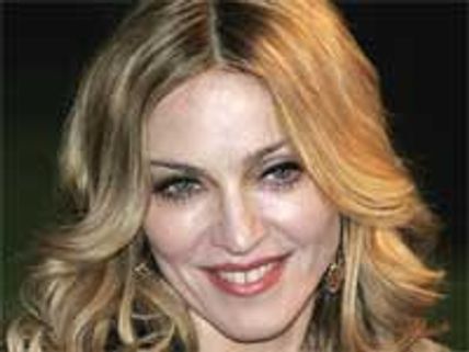 Madonna hits out at muscly altered pics