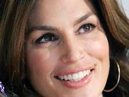 Cindy Crawford flaunts her bikini body