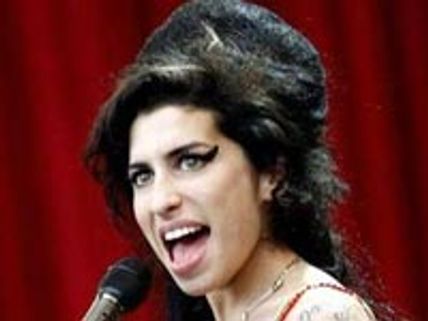 Winehouse’s Miami trip may unite her and Blake