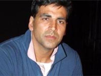 Akshay teaches his son to roller blade