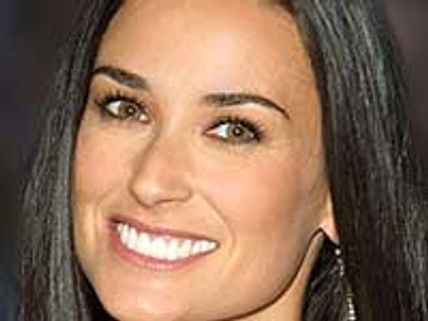 Demi Moore turns seductress