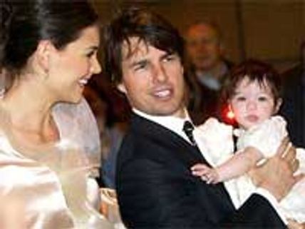 Tom Cruise, wife help Travolta return to public life