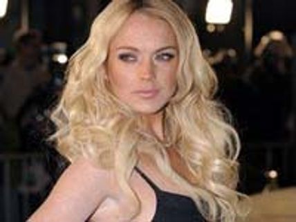 Lindsay Lohan leaves her burgled house