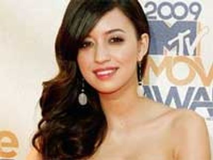 Twilight star Christian Serratos stands naked