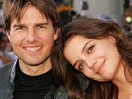 Tom and Katie fondle in public