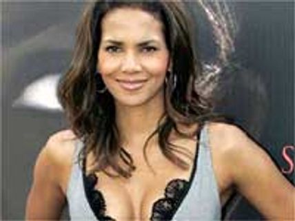 Halle Berry asks fans to help battered women
