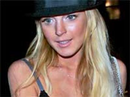 Lindsay Lohan slams self arm reports