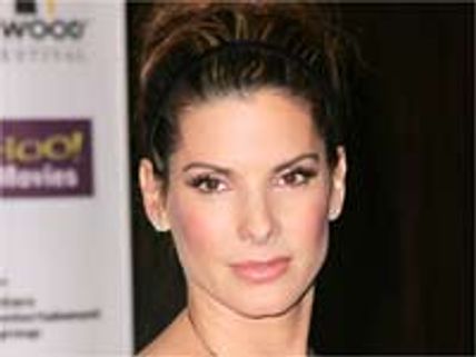 Sandra Bullock walks away with the Oscar award