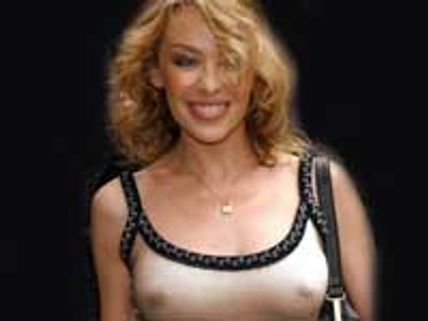 Kylie Minogue strips for breast cancer campaign