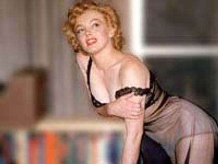 Marilyn Monroe pink gown fetches £213,000