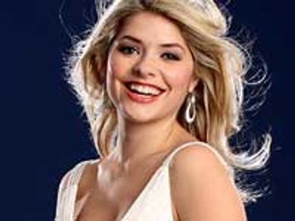 Holly Willoughby wears nothing underneath her coat