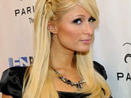 Paris Hilton's beau fired from nightclub over arrest