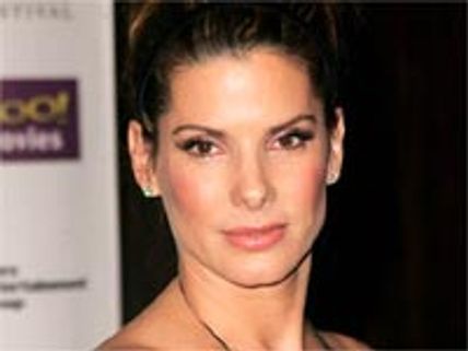 Sandra Bullock's baby son is 'crown prince' of all girls home