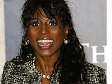 Sinitta goes nude for sexy shoot on back of chair