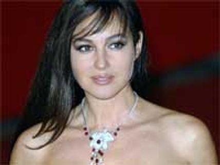 Monica Bellucci poses nude with her newborn baby