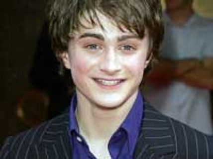 Radcliffe stunned by Emma's kissing enthusiasm