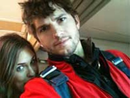 Ashton Kutcher's mistress puts his sweater on sale