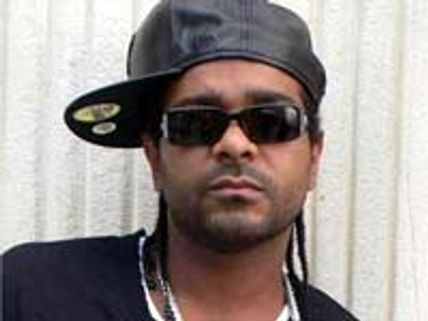 Jim Jones sued for using topless photos of girls