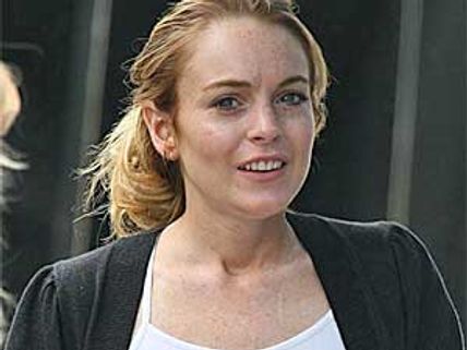 Lindsay Lohan suffers wardrobe malfunction at Miami