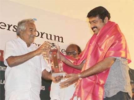 Salim Ahmed felicitated by CM Oommen Chandy