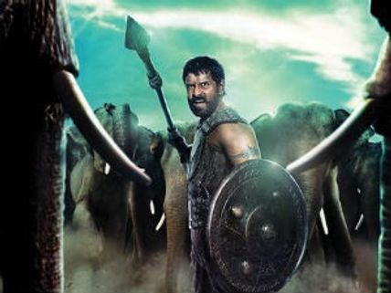 Who's written script for Vikram's Karikalan?