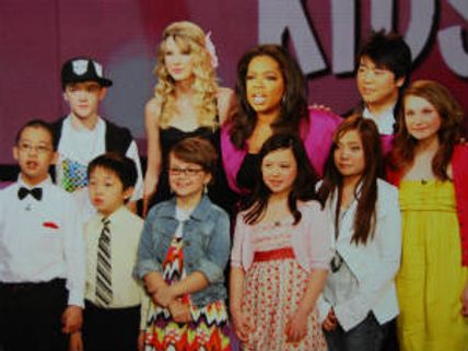 Taylor Swift gifts guitar to young fan Jordan on Oprah Winfrey show