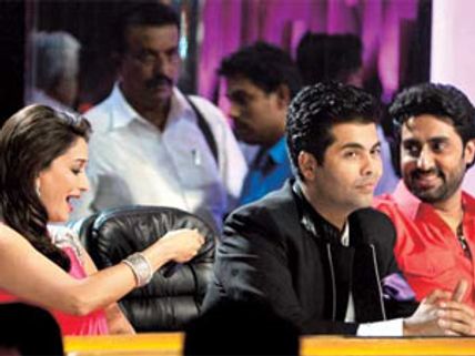 Abhishek Bachchan shows Aaradhya's photos to Madhuri Dixit