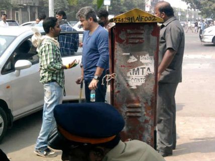 Pictures: Ajith Kumar hobbles out on a walking stick