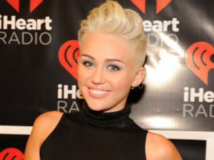 Miley Cyrus hires fan to promote We Can't Stop