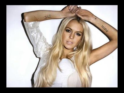 Lindsay Lohan strips to promote The Canyons