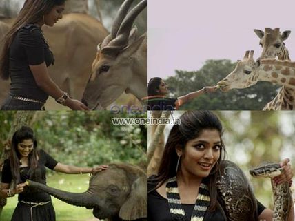 OMG! Rima Kallingal Holds A Python