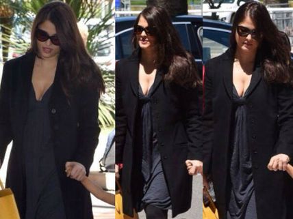 Aishwarya Rai Flashes Major Cleavage While Leaving Cannes