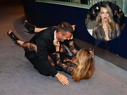 LOL! Cara Delevingne Fell At GQ Awards 2014