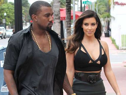 Kim, Kanye Spice Up Marriage, Go Bare To Yoga Classes!!!