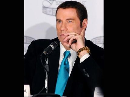 John Travolta Denies Gay Romance Allegations