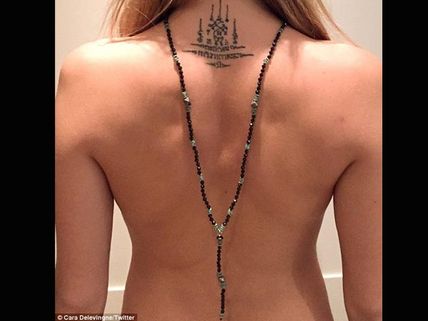 Cara Delevingne Goes Topless, Posts Photo Online
