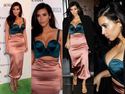 Kim Kardashian Flaunts Major Cleavage At ACRIA Dinner